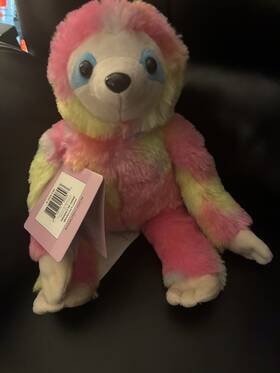Health Touch 889779008093 Huggable Massager Colorful Sloth Vibration Plush