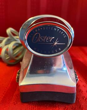 146018 Oster Ultra Scientific Hand Massager #146018 Color Silver Very Good Condition