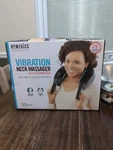 Homedics Soothes Neck Tension Vibration Massager With Heat & Handles. Fixed Price $13.00.