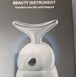 Handheld Rechargeable Neck Massager, Red Light Therapy Face Lift VE718 White. Fixed Price $20.00.