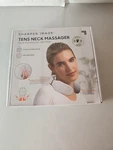 Sharper Image Tens Neck Massager Pulse Technology With Heat. New. Fixed Price $45.00.