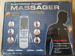 Trumedic Tens Electronic Pulse Massager With 4 Electrode Pads (PL-009). Fixed Price $14.88.