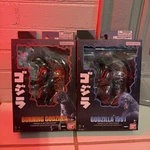 Set Of Two Bandai Namco Godzilla Action Figure Age Level 4-7. Fixed Price $75.00.
