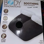 Black Body Innovations Soothing Foot Warmer With Vibration Massage Memory Foam. Fixed Price $17.99.