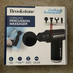 Brookstone Cordless Percussion Massager 4 + Interchangeable Heads Rechargeable. Fixed Price $35.00.