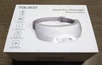 Toloco TL-EM08 Gray White Usb Bluetooth Music Smart Eye Massager Fatigue. Fixed Price $25.55.