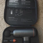 Sharper Image Powerboost Plus Deep Tissue Percussion Massage Gun, 6 Heads. Fixed Price $80.00.