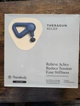 Theragun Relief Handheld Massage Navy (3 Head Attachments) New In Box. Fixed Price $140.00.