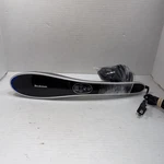 Brookstone Handheld Heating Percussion Body Massager. Fixed Price $50.00.