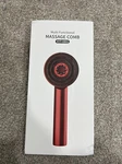 New, Red Multifunctional Therapy Scalp Massage Comb #XYT-0801. Fixed Price $27.99.