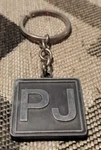 Pearl Jam - Pj 20 Key Chain. Fixed Price $49.99.