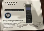 Sharper Image T.e.n.s. Massager With Handheld Control W/2 Electrode Pads. Fixed Price $10.00.