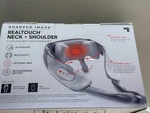 Sharper Image Realtouch Neck + Shoulder Cordless Deep Tissue Massager. Fixed Price $39.00.