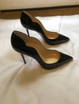New Authentic Christian Louboutin Black Leather Hot Chick Pointed Toe Pump. Fixed Price $465.00.
