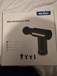 Sejoy Mini Gun Muscle Tissue Percussion Relief Vibration Massager, Black. Fixed Price $15.00.