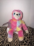 Health Touch Huggable Massager Vibrating Multi-colored Sloth Pink Blue Plush New. Fixed Price $20.00.