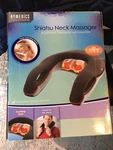 Homedics Shiatsu Neck Massager With Heat, (#NMS-300) New Open Box. Fixed Price $25.00.