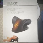 Trakk Heated Neck Stretcher For & Shoulder Relaxation, Black. Fixed Price $10.00.