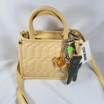 Steve Madden BNIKO3 Yellow Crossbody Top Handle Satchel Bear Heart Dice Charms. Fixed Price $49.00.