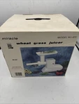 Miracle MJ-550 Electric Wheat Grass Juicer With Attachments New Box. Fixed Price $126.09.