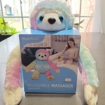 Health Touch Huggable Massager Rainbow Sloth With Relaxing Vibration Pastel. Fixed Price $14.00.