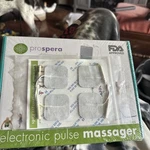 Prospera Electronic Pulse Massager With New Pads. Fixed Price $15.00.