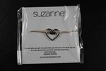 Suzanne Somers - Love Bracelet Silver Heart On Gold Satin Cord New. Fixed Price $20.00.