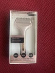 Finishing Touch Flawless Facial Massage Ice Roller. Fixed Price $8.33.