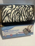 Health Touch Foot Massagers With Comfortable Zebra Print Fabric, Vibration. Fixed Price $22.99.