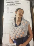 "sharper Image Heated Neck And Back Massager. Fixed Price $55.00.