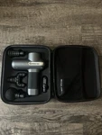 Booster Handheld Cordless Percussion Massage Gun. Fixed Price $65.00.