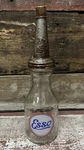Esso 1 Qt. Glass Motor Oil Bottle With Tin Master Mfg. Co. Spout & Cap. Fixed Price $64.00.