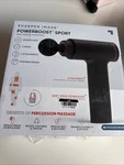 Sharper Image Powerboost Sport Massage Gun, Multispeed, Cordless, 3 Attachments. Fixed Price $42.99.